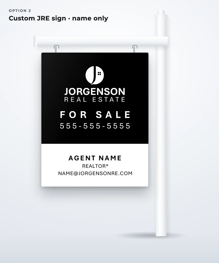 Custom JRE sign with the agent’s phone number and a white bottom panel with just the agent’s name and two lines of text
